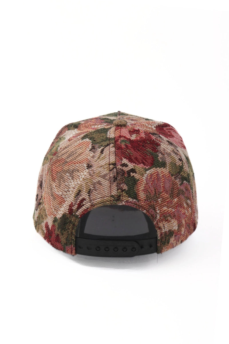 The back view of a structured baseball cap featuring a black plastic snap closure.